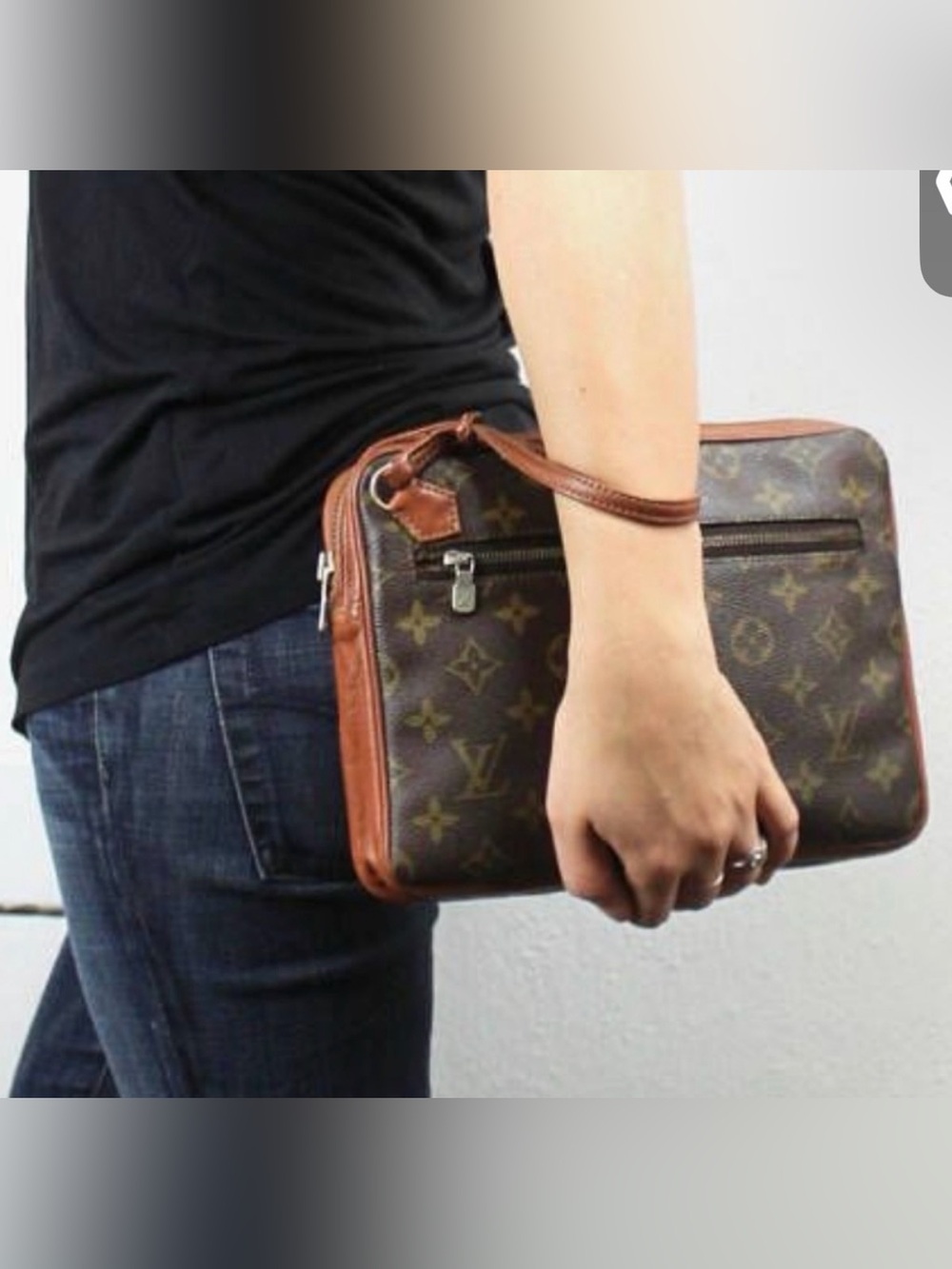 a vintage Louis Vuitton Pochette Sport clutch bag